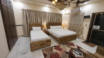 Deluxe kamer, 1 twee- of 2 eenpersoonsbedden | Geluiddichte muren, gratis wifi