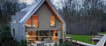 Luxurious lodge for 8 guests in Belgian Limburg, featuring abundant natural light, modern amenities, and a tranquil, nature-rich environment.