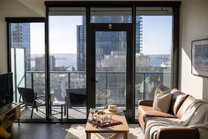 Deluxe Apartment, 1 Queen Bed with Sofa bed, Bay View (Self Check-in with Virtual Front Desk) | Living area | 40-inch Smart TV with digital channels