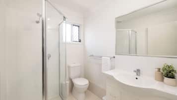 Shower, hair dryer, soap, shampoo