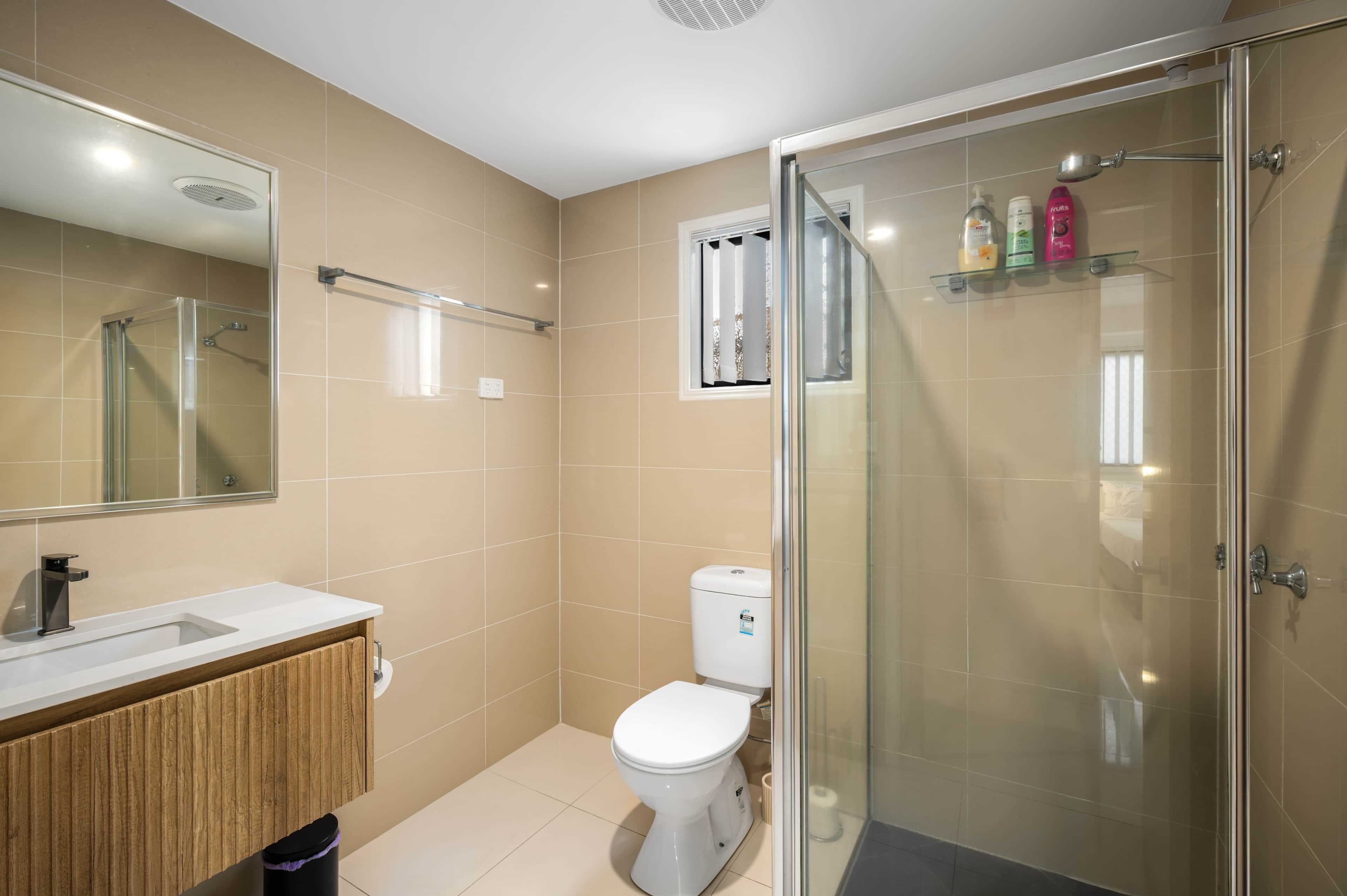 Shower, hair dryer, soap, shampoo