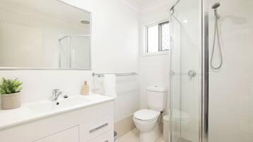 Hair dryer, towels, soap, shampoo