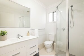 Hair dryer, towels, soap, shampoo