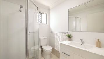 Shower, hair dryer, soap, shampoo
