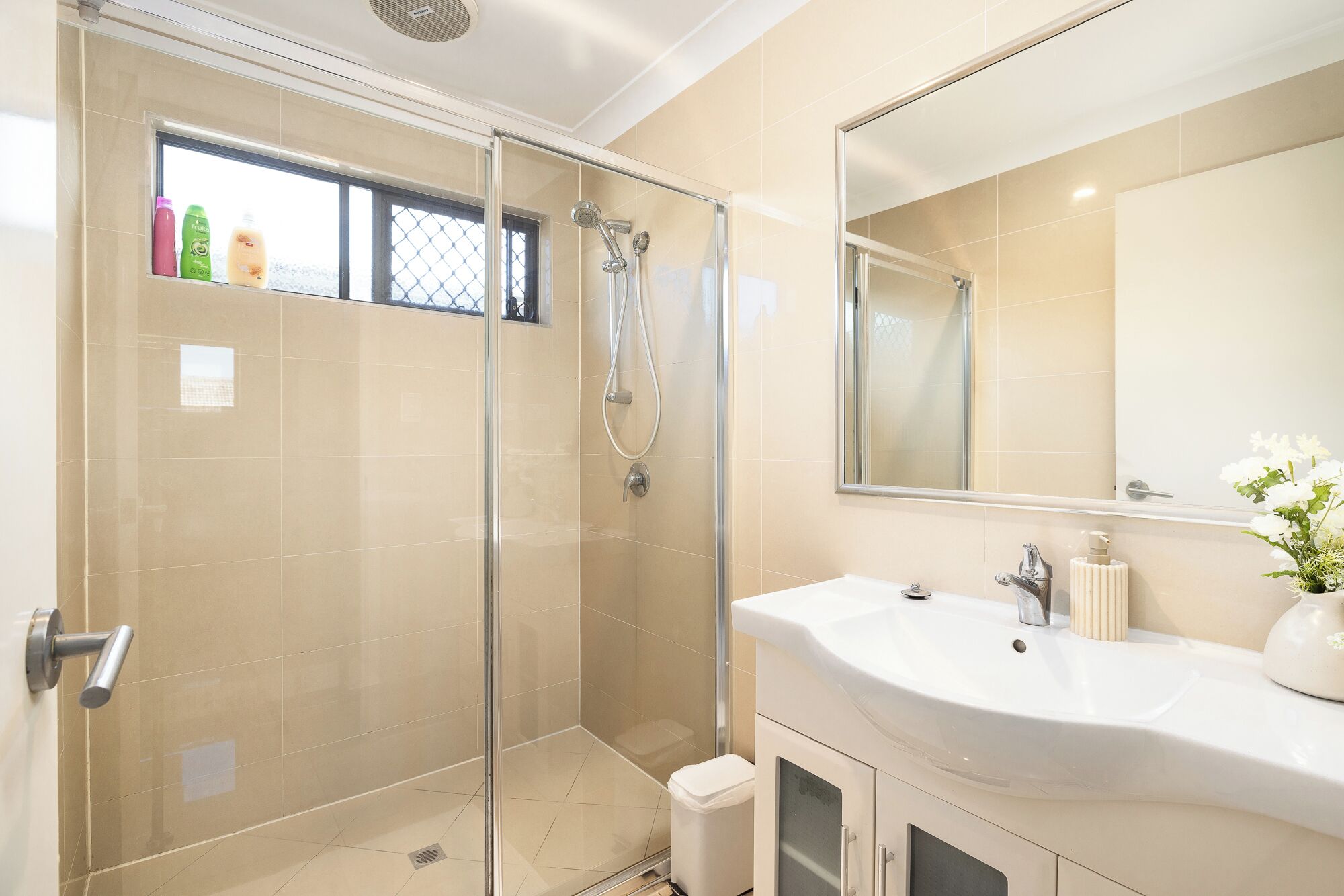 Shower, hair dryer, soap, shampoo