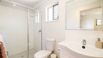Shower, hair dryer, soap, shampoo