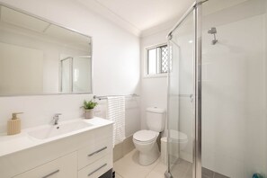 Shower, hair dryer, soap, shampoo