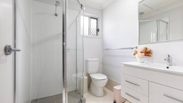 Hair dryer, towels, soap, shampoo