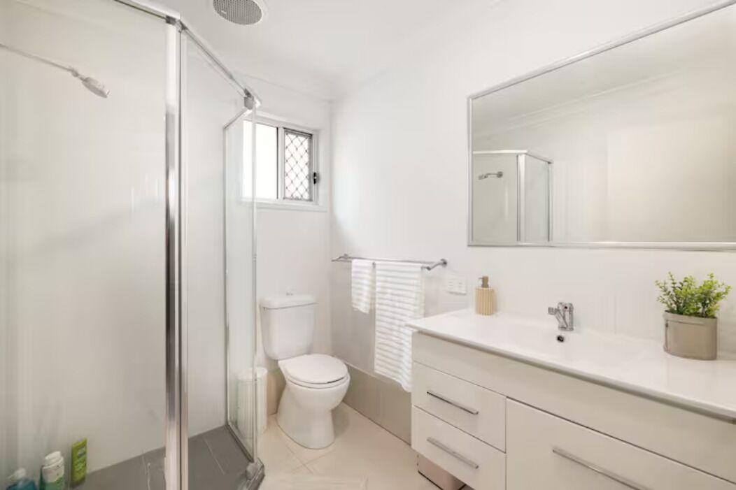 Shower, hair dryer, soap, shampoo