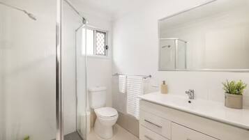 Shower, hair dryer, soap, shampoo