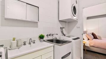 Hair dryer, towels, soap, shampoo