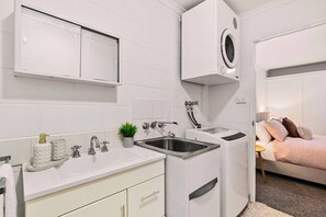 Hair dryer, towels, soap, shampoo