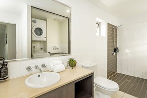 Hair dryer, towels, soap, shampoo