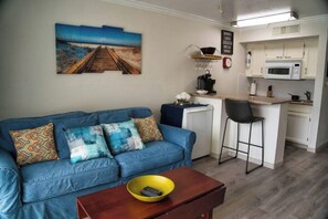 Living area - Island Beachwalk Waterfront! 2 Pools/Hot Tubs View

 (Galveston)