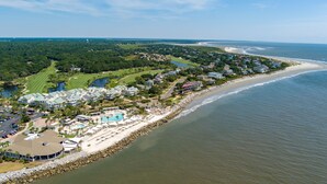 A coastal resort with a beach, a golf course, and a large pool. - Luxury Villa, Club Access, Beach, Pet-Friendly (Seabrook Island)