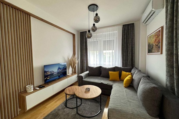 Comfort Apartment, Balcony | Living area | Flat-screen TV