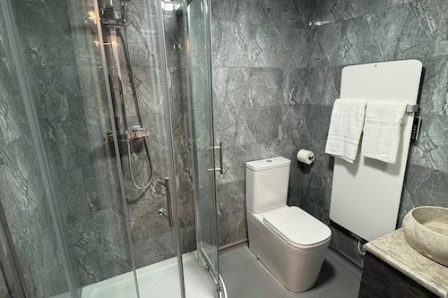 Shower, shampoo, toilet paper