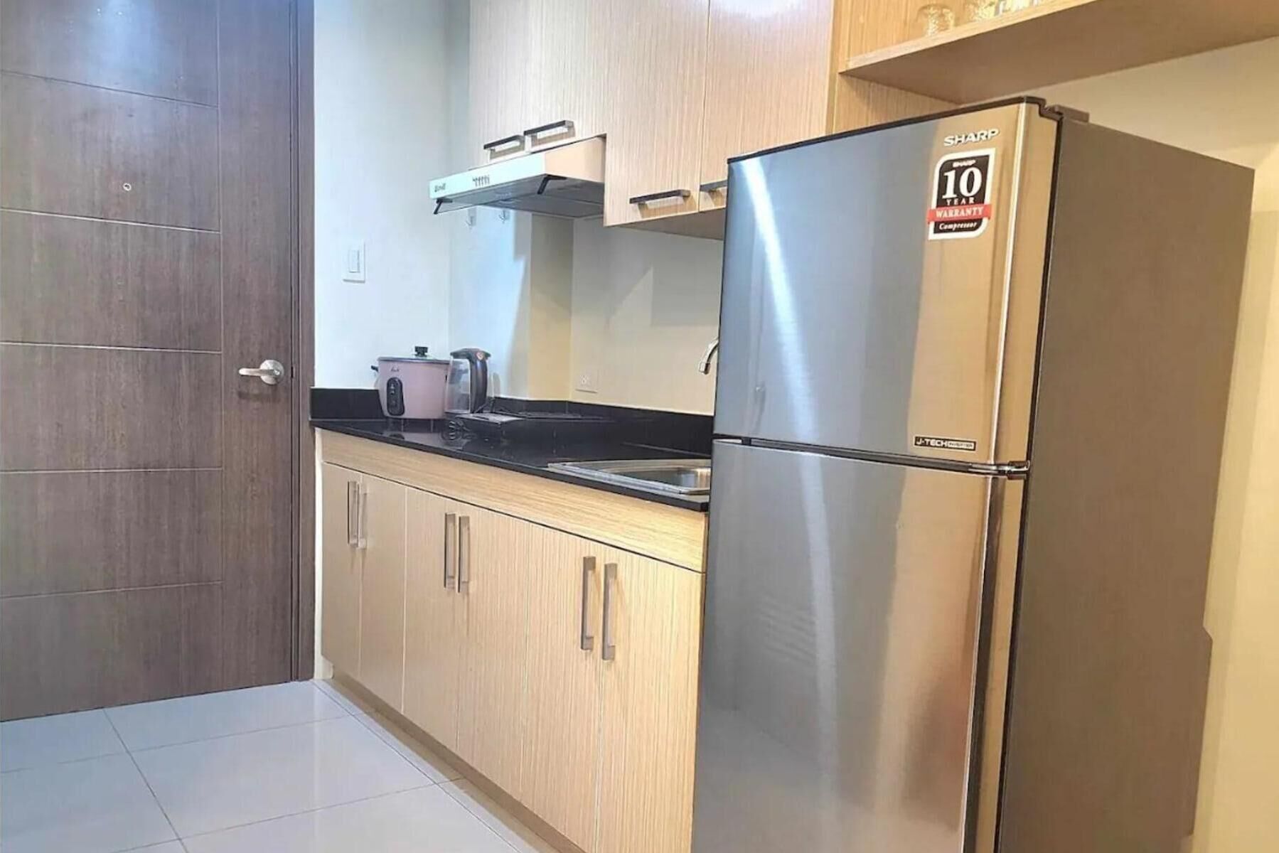 Fridge, electric kettle, highchair, cookware/dishes/utensils