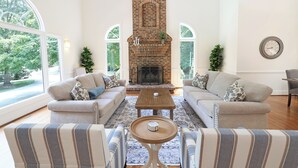 Living area - Lg Pool House w/ Hot Tub Central to RTP*Pool OPEN* (Durham)
