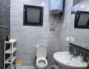 Dutxa, tovalloles, sabó i xampú 