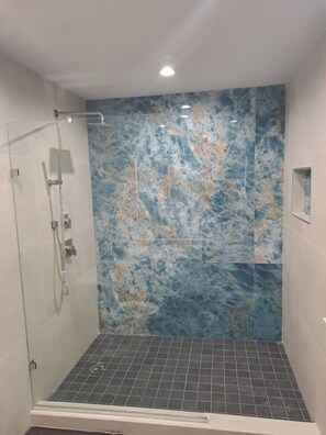 Shower, hair dryer, towels, soap