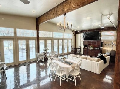 Red Roof Farmhouse has beds for 27, a 12 person swim spa, 1350 sq ft activity rm
