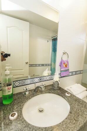 Shower, towels, soap, toilet paper