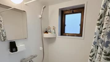Hair dryer, bidet, towels, soap
