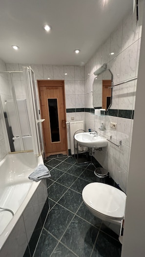 Shower, hair dryer, towels