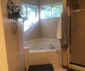 Jetted tub, hair dryer, towels, soap