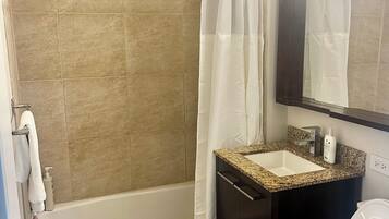 Hair dryer, towels, soap, toilet paper