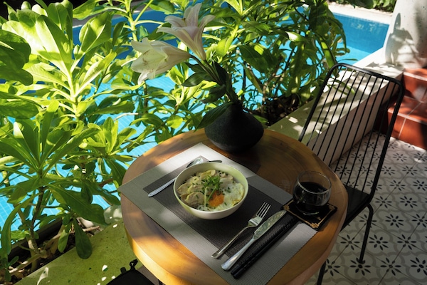 Morgunverður samkvæmt innlendum hefðum daglega (120000 VND á mann)