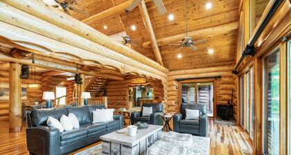 Charming log home with stunning lakefront views, hot tub, boat rental available