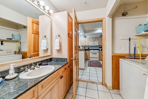 Shower, hair dryer, towels, shampoo
