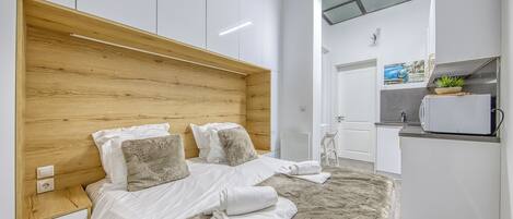 1 غرفة نوم ومكواة/لوح كي وواي فاي مجانًا وملاءات أسرّة