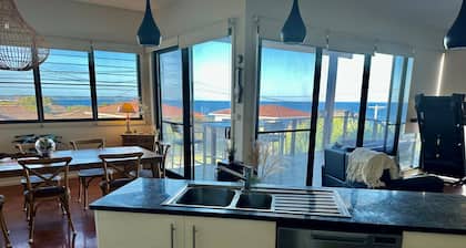 Second level on Honey Suckle with Stunning Ocean Views.