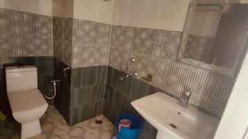 Shower, rainfall showerhead, towels, soap