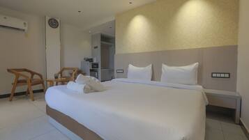 Deluxe Room | Premium bedding, blackout curtains, soundproofing, iron/ironing board