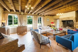 Fireplace, foosball, books