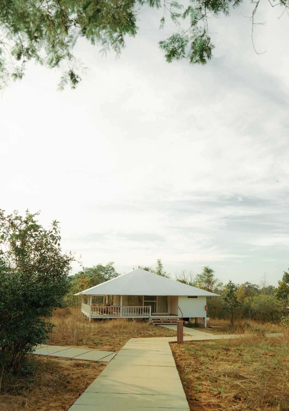 A single-story house with a flat roof and a porch.