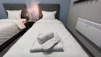 4 bedrooms, iron/ironing board, WiFi, bed sheets