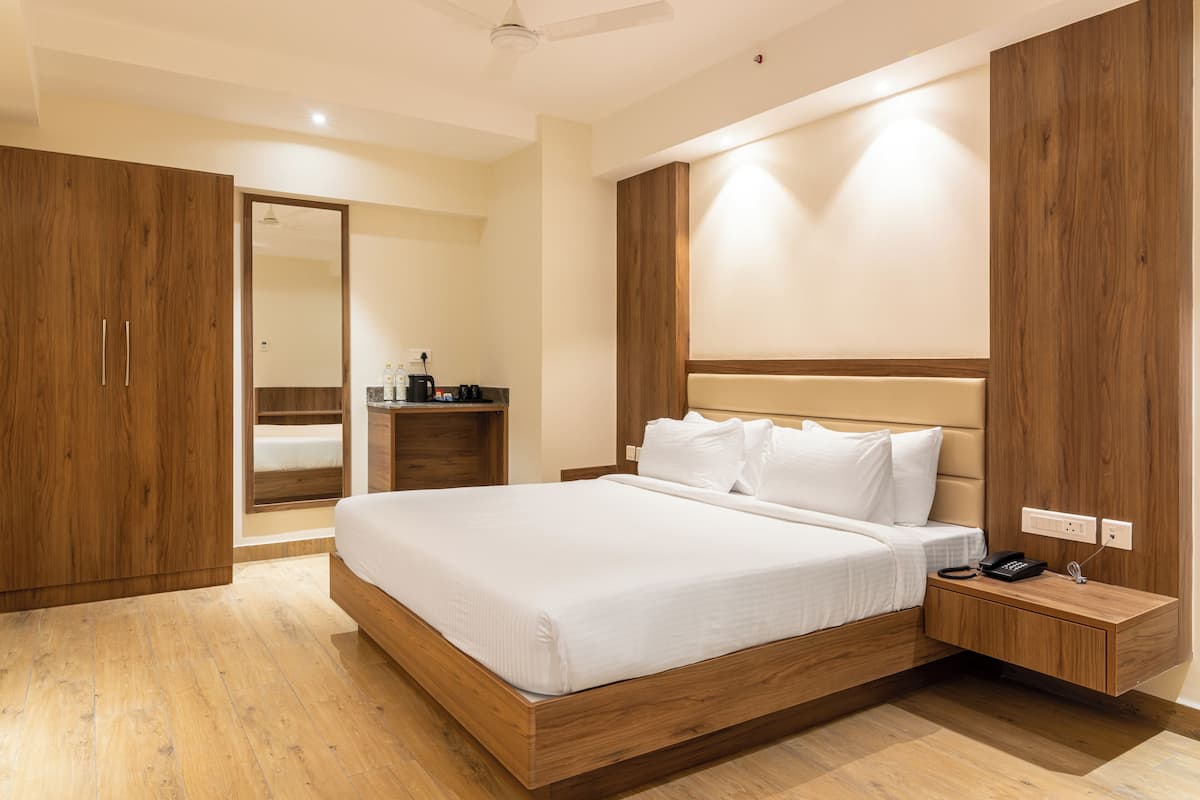Quarto elite | Individualmente mobiliados, escrivaninha, Wi-Fi de cortesia