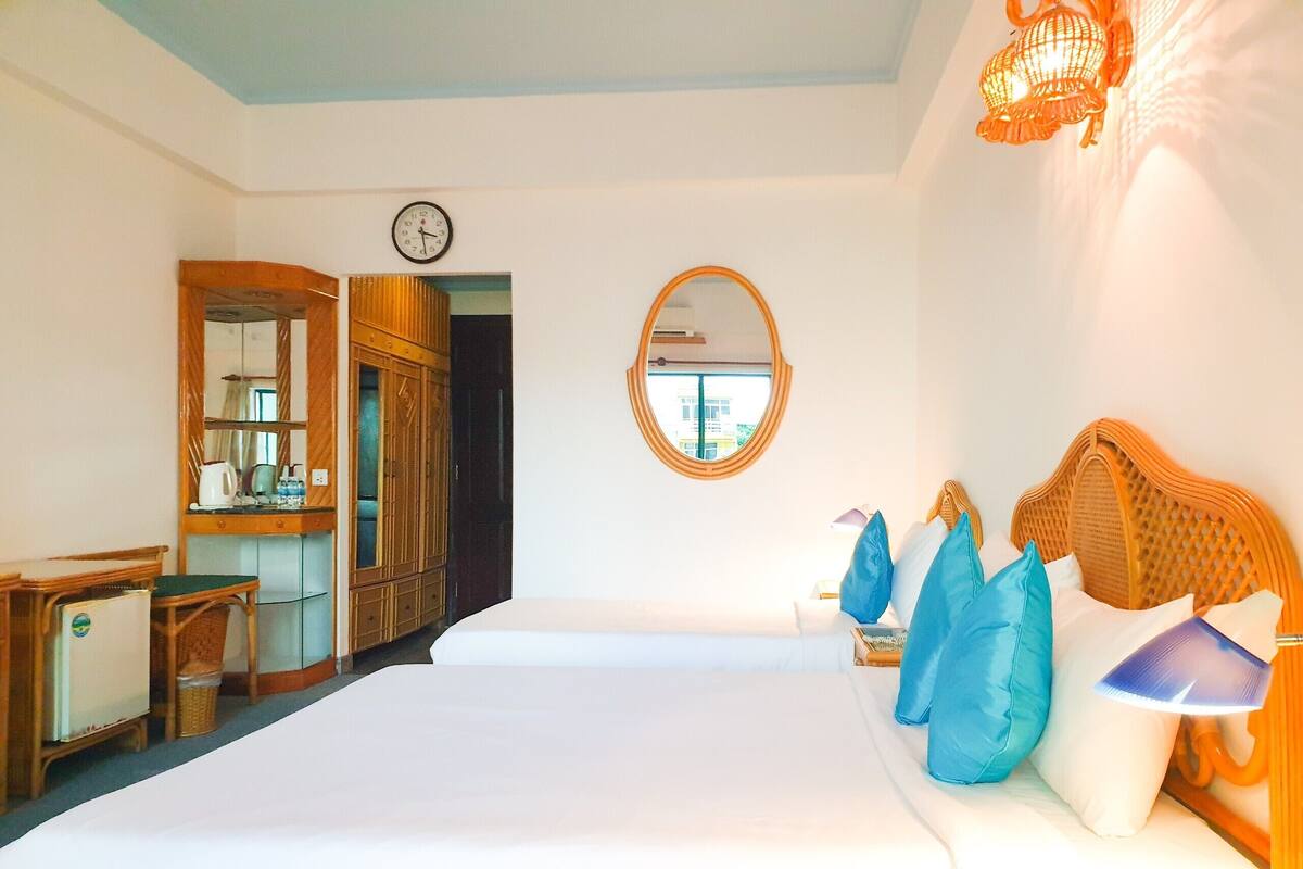 Premium bedding, desk, laptop workspace, free WiFi