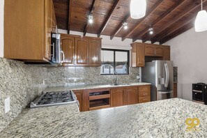 Fridge, microwave, oven, stovetop - Blissful Bay Views, Steps to Beach, Private Yard (El Centenario)