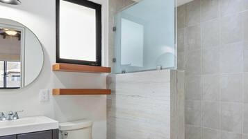 Shower, hair dryer, towels, soap