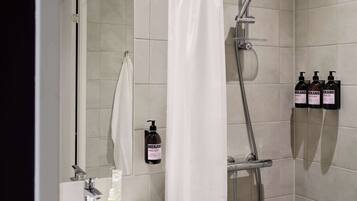 Shower, eco-friendly toiletries, hair dryer, towels