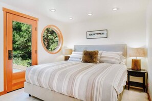 1 bedroom, desk, iron/ironing board, travel crib