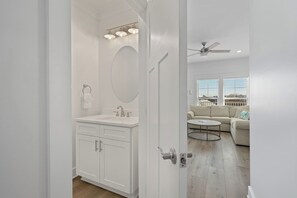 Comfort House, Pool Access, Lake View | Bathroom | Combined shower/tub, hair dryer, soap, shampoo - Modern House with Pool Access (Panama City Beach)