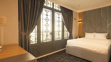 2 bedrooms, blackout curtains, soundproofing, iron/ironing board