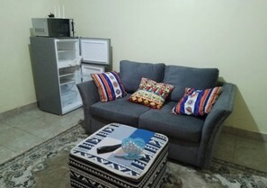 Appartement, 1 chambre | Aire de séjour